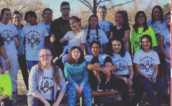 Running 505 youth group in matching shirts